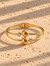 Cargar imagen en el visor de la galería, Brazalete esfera dorada
